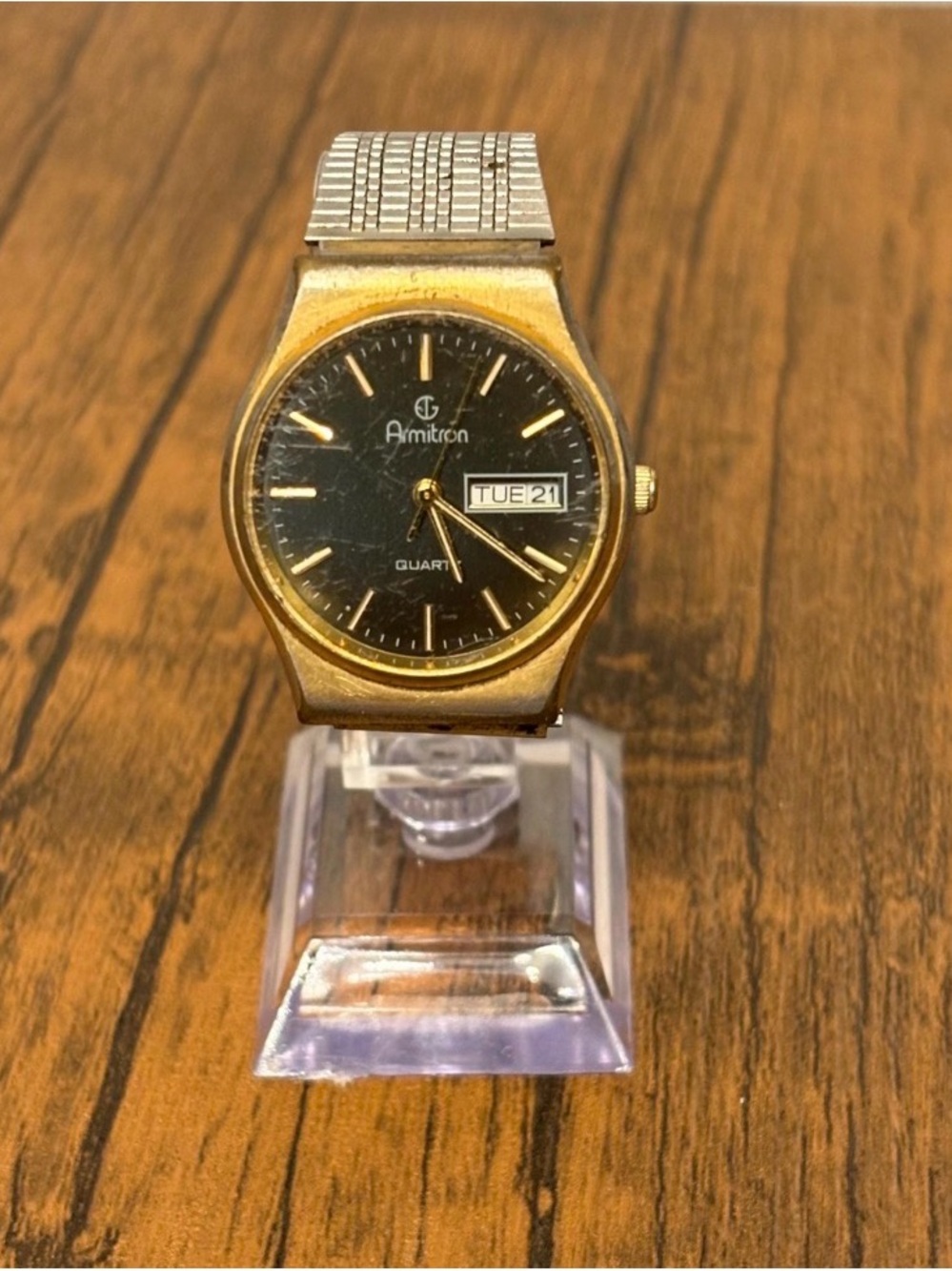 Armitron Gold-Tone Watch with Black Dial and Day/Date